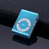 A close-up shot of a small, blue portable music player resting on a dark, textured surface. Produktbild-Vorschau