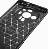 Close-up view of the interior of a black phone case with a geometric pattern and a hexagonal emblem. Produktbild-Vorschau