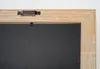 A close-up view of the back of a wooden picture frame, showing the hanging hardware. Podgląd zdjęcia produktu