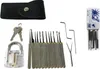 A collection of lock picking tools, a transparent practice lock, keys, and a carrying case. Produktbild-Vorschau