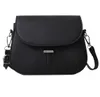 A black leather crossbody bag with a flap closure. Náhľad obrázku produktu