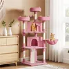 A pink cat tree with two cats on it, placed next to a wooden dresser and in front of a window. Produktbild-Vorschau
