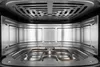 Close-up view of the interior of an air fryer, showing heating elements and the metallic interior. Produktbild-Vorschau