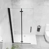 A modern bathroom with a black-framed glass shower enclosure. Produktbild-Vorschau