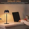 A desk scene with a person using a laptop and a desk lamp. Náhľad obrázku produktu