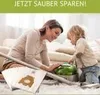 A woman and a child are on the floor with a vacuum cleaner and vacuum bags. Produktbild-Vorschau