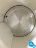 Close-up view of the bottom of a kettle, showing the heating element and some water stains. Produktbild-Vorschau