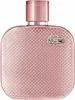 A close-up studio shot of a pink Lacoste perfume bottle. Podgląd zdjęcia produktu