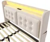 A close-up view of a bed frame's headboard with integrated LED lighting. Produktbild-Vorschau