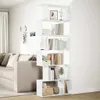 A white bookshelf is placed next to a sofa in a living room. Náhled obrázku produktu