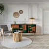 A stylish living room scene featuring a colorful sideboard, armchair, and coffee table. Anteprima dell’immagine prodotto