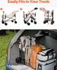 The image shows a folding wagon being packed into a car trunk, along with other outdoor gear. Produktbild-Vorschau