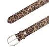 A close-up shot of a leopard print belt with a silver buckle. Produktbild-Vorschau