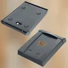 Two views of a gray mailbox with a postal logo, set against a gradient brown background. Náhľad obrázku produktu