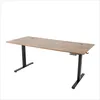 A standing desk with a brown wood-grain top and black metal legs, isolated on a white background. Náhled obrázku produktu