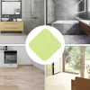 Collage of bathroom, kitchen, and home interior scenes with a light green bath mat in the center. Produktbild-Vorschau