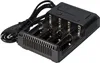 A black battery charger with four slots and a power cord. Produktbild-Vorschau