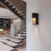 A modern interior with a staircase and a wall lamp. Anteprima dell’immagine prodotto
