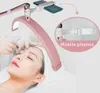 A person receiving a beauty treatment under a pink LED light fixture with a phone holder. Náhľad obrázku produktu