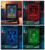 A collage of four images, each showing a framed artwork with LED lighting, displayed on a desk next to a vintage television. Podgląd zdjęcia produktu