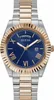A close-up studio shot of a men's watch with a blue dial, silver and rose gold band, and a fluted bezel. Produktbild-Vorschau