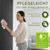 A woman is cleaning a dark, ribbed wall panel with a white cloth. Text overlays highlight product features. Produktbild-Vorschau