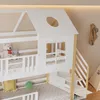 A close-up view of a white and natural wood bunk bed with a house-shaped top. Podgląd zdjęcia produktu