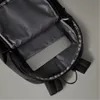 The inside of an open backpack with a laptop inside. Produktbild-Vorschau