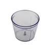 A clear plastic container with a small metal spindle in the center, isolated on a white background. Náhled obrázku produktu