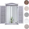 A mirror with shutter-style side panels, displayed against a white background. Several circular swatches of different finishes are shown to the right. Náhled obrázku produktu