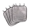 A stack of four silver seat cushions with black trim and loops on top, isolated on a white background. Produktbild-Vorschau