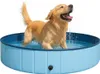 A golden retriever dog is playing in a blue, foldable dog pool filled with water. Produktbild-Vorschau