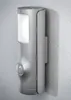 A silver motion-activated outdoor light with a white LED panel is mounted on a textured wall. Produktbild-Vorschau