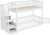 A white bunk bed with stairs and a door. Voir les images du produit