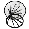 A top-down view of a round dining table with a marble-patterned tabletop and black metal legs. Produktbild-Vorschau