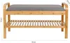 A bamboo shoe rack with a gray padded seat. Produktbild-Vorschau
