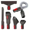 A collection of vacuum cleaner attachments arranged on a white background. Produktbild-Vorschau