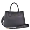 A black Valentino handbag with a detachable strap is shown against a white background. Produktbild-Vorschau
