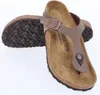 A pair of Birkenstock sandals on a white background. Produktbild-Vorschau