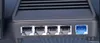 A close-up view of the rear ports of a black Xiaomi Tri-Band Wireless Wi-Fi 6 Router. Náhled obrázku produktu