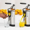 A split image showing a person using a juicer to make orange juice. The left side shows the juicer with oranges in the background and a hand operating the juicer. The right side shows orange juice being dispensed into a glass. Produktbild-Vorschau