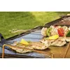 Food being grilled on a barbecue. Produktbild-Vorschau