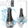 A product shot of a cordless water flosser with accessories and packaging. Voir les images du produit
