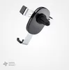 A black and silver car phone mount with a clip for an air vent, shown against a white background. Voir les images du produit