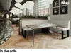 Interior of a modern cafe with seating arrangements and decor. Produktbild-Vorschau
