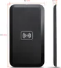 A black wireless charger is shown with dimensions indicated. Produktbild-Vorschau