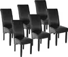 A group of six black dining chairs arranged in a studio setting against a white background. Náhled obrázku produktu