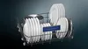 A dishwasher rack filled with clean dishes, including plates and a pot. Produktbild-Vorschau