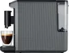 Side view of a compact coffee machine with a cup of espresso. Produktbild-Vorschau