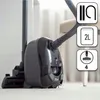 A black vacuum cleaner is shown on a light-colored carpet, with graphical icons indicating features. Produktbild-Vorschau